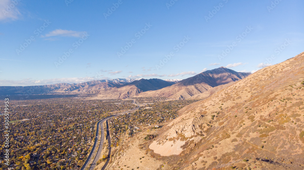 Salt Lake City Skyline, Downtown Aerial Drone. Neighborhood with mountains in the background Salt Lake City Skyline, Downtown Aerial Drone. Neighborhood with mountains in the background