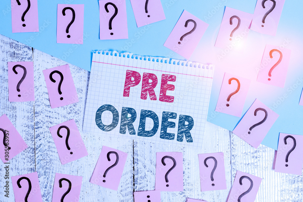 Text sign showing Pre Order. Business photo showcasing an order for a product placed before it is available for purchase Scribbled and crumbling papers with thick cardboard above wooden table Text sign showing Pre Order. Business photo showcasing an order for a product placed before it is available for purchase Scribbled and crumbling papers with thick cardboard above wooden table