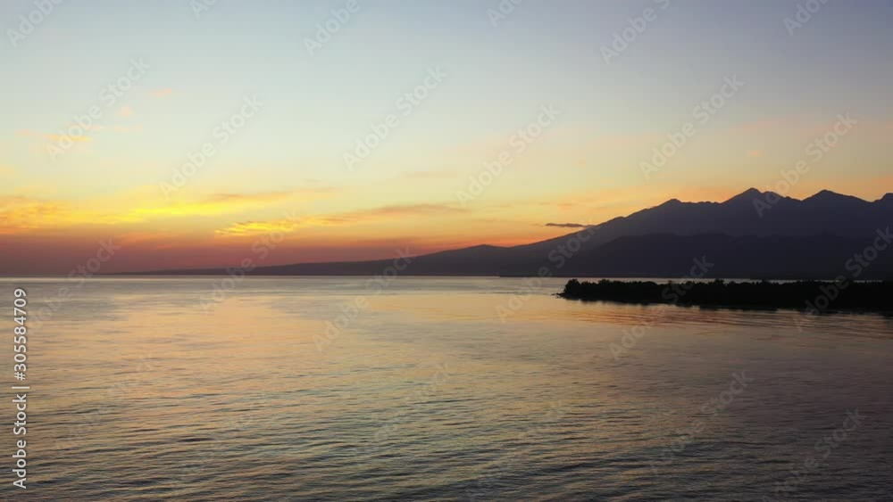 The Beautiful Scenery in Thailand During Twilight With Mountain and Calm Ocean - Wide Shot The Beautiful Scenery in Thailand During Twilight With Mountain and Calm Ocean - Wide Shot
