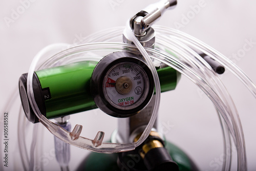 Fototapeta Close-up of a oxygen cylinder regulator and cannula