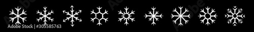Set of icy snowflakes symbol vector illustration. White chalk sketch frozen snowflake isolated on blackboard for new year celebration snow decoration ornament or christmas festive frost flakes design
