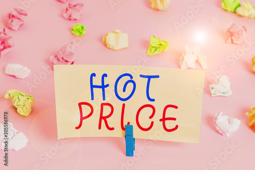 Word writing text Hot Price. Business photo showcasing Buyer or seller can obtain something for a product sold or buy Colored crumpled papers empty reminder pink floor background clothespin © Artur