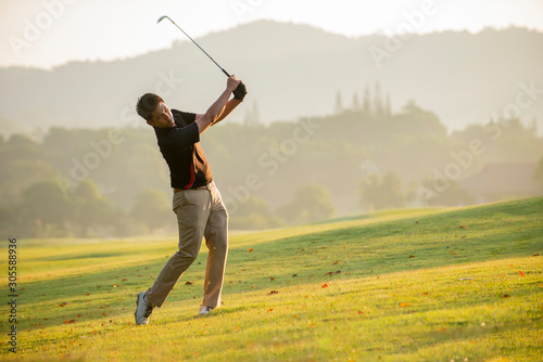 golfer playing golf at golf course