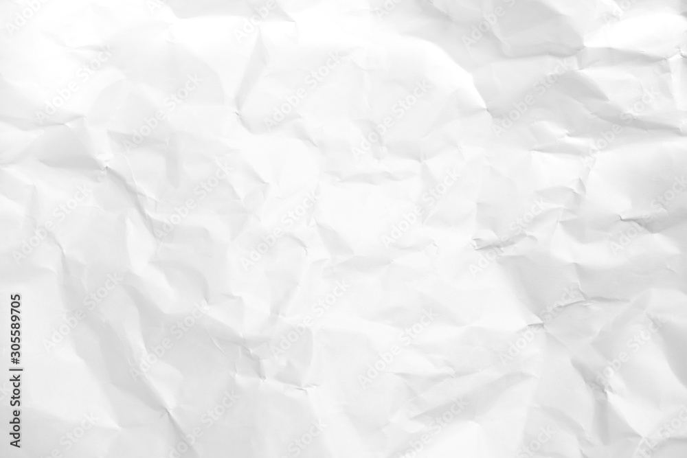 Obraz premium White crumpled paper texture background.