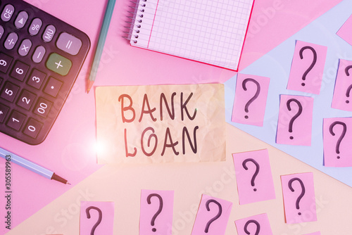 Writing note showing Bank Loan. Business concept for an amount of money loaned at interest by a bank to a borrower Mathematics stuff and writing equipment above pastel colours background