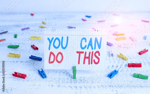 Handwriting text writing You Can Do This. Conceptual photo Eagerness and willingness to overcome challenges in life Green clothespin white wood background colored paper reminder office supply