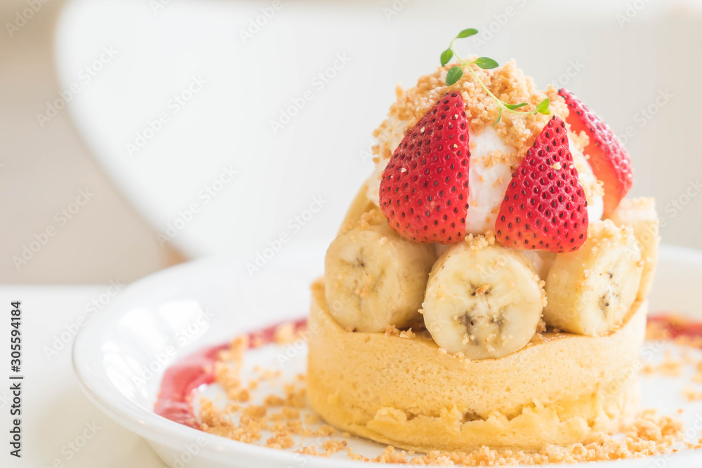 hot cake with cream, strawberry, banana and cookie crumble hot cake with cream, strawberry, banana and cookie crumble