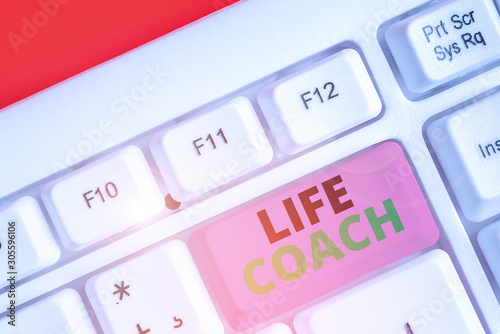 Conceptual hand writing showing Life Coach. Concept meaning someone who helps identify your goals and plan to achieve them photo