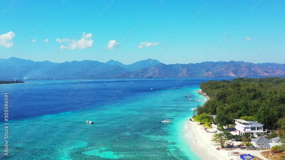 Gili meno island - A Perfect Vacation Destination With Hotels Facilities Recreation And Outdoor Activities Along With The Scenic Attractions - Aerial Shot Gili meno island - A Perfect Vacation Destination With Hotels Facilities Recreation And Outdoor Activities Along With The Scenic Attractions - Aerial Shot
