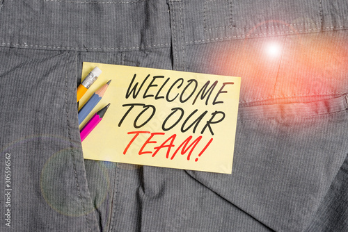 Writing note showing Welcome To Our Team. Business concept for introducing another demonstrating to your team mates Writing equipment and yellow note paper inside pocket of man trousers