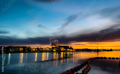 Long Exposure sunset contrasts with the sky in many colorful. Beautiful morning At the bank of the menominee river