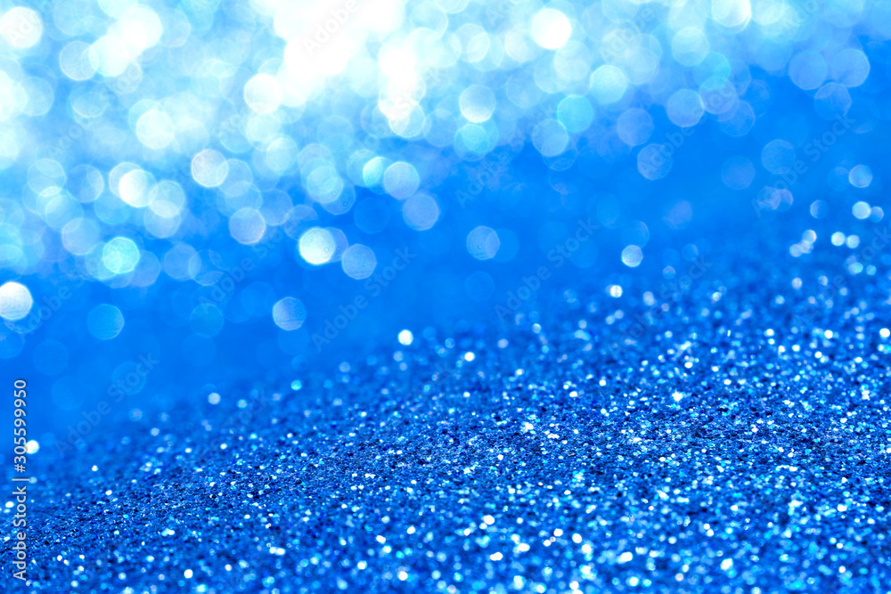 sparkles of blue glitter abstract background	