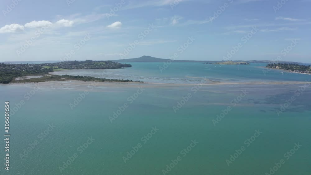 Flight over sea, with Browns and Motuihe island, Auckland, aerial shot Flight over sea, with Browns and Motuihe island, Auckland, aerial shot