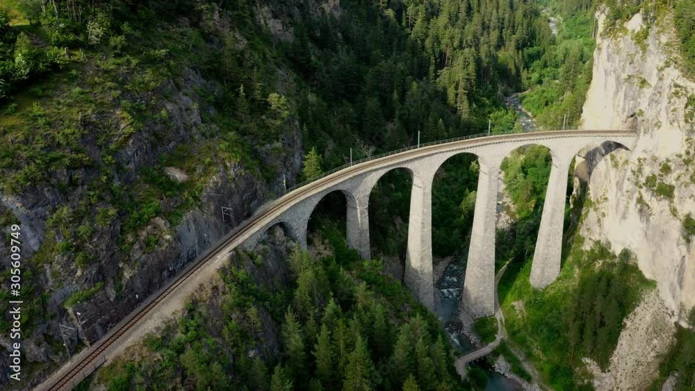 Famous Viaduct in Switzerland at the village of Filisur - aerial photography Famous Viaduct in Switzerland at the village of Filisur - aerial photography