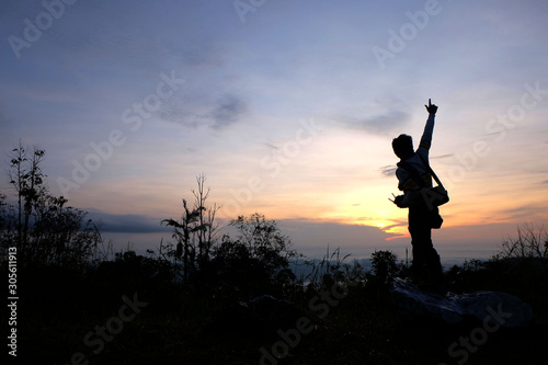 Silhouette of traveller at Khao Krajome, Suan Phueng, Ratchaburi province, Thailand