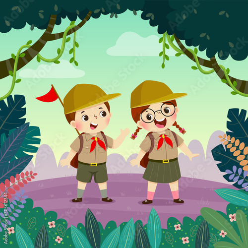 Cute scout boy and scout girl hiking in the forest. Children have summer outdoor adventure.