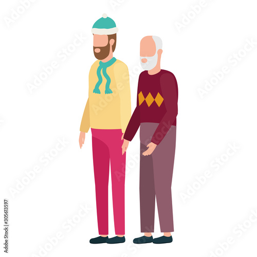 cute grandfather with young son using christmas hat