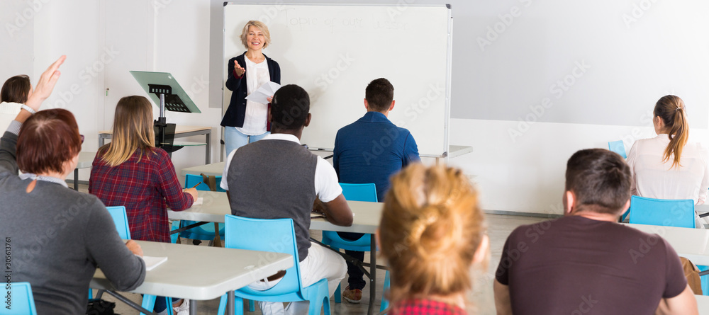 © JackF - Students with teacher studying in classroom © JackF - Students with teacher studying in classroom