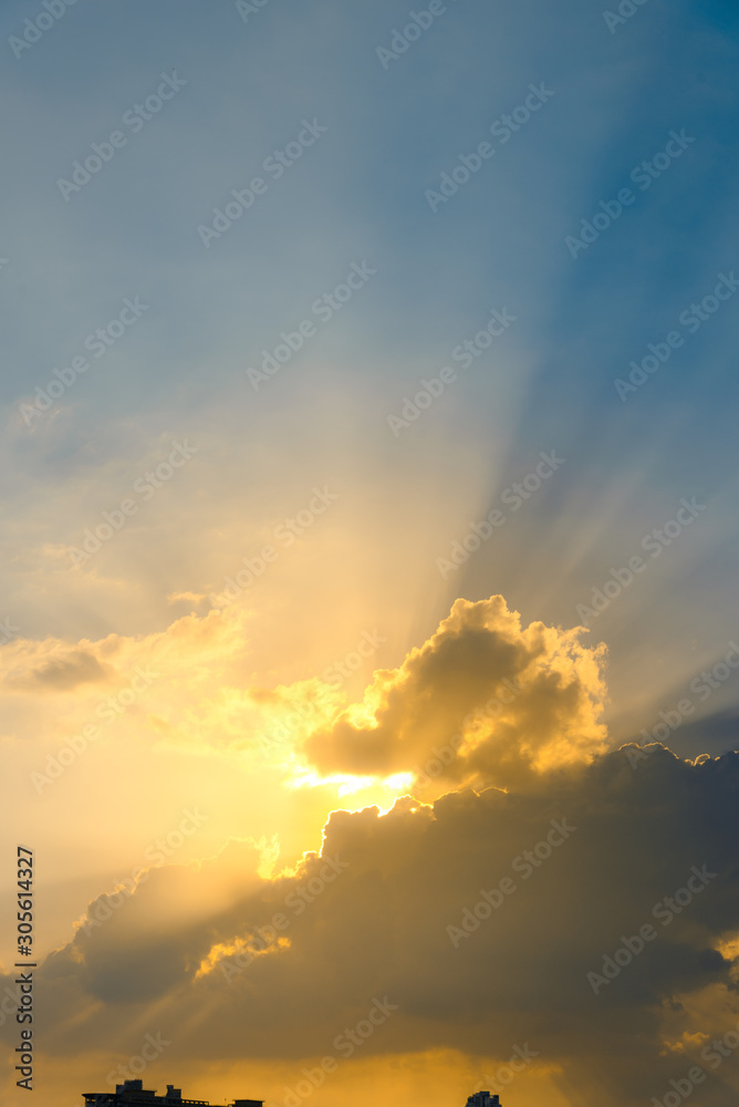 Beautiful dramatic sky clouds with light rays at sunset. Natural landscape for background Beautiful dramatic sky clouds with light rays at sunset. Natural landscape for background