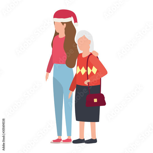 cute grandmother with daughter using christmas hat
