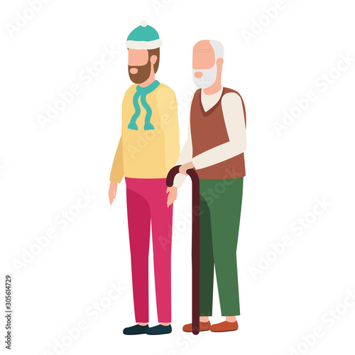 cute grandfather with young son using christmas hat
