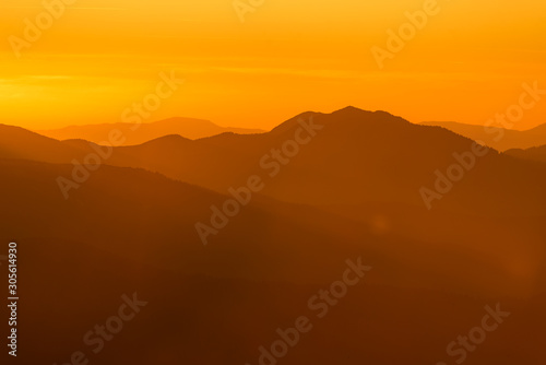 Mountains silhouette at colorful sunset