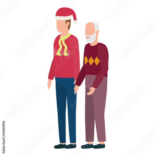 cute grandfather with young son using christmas hat