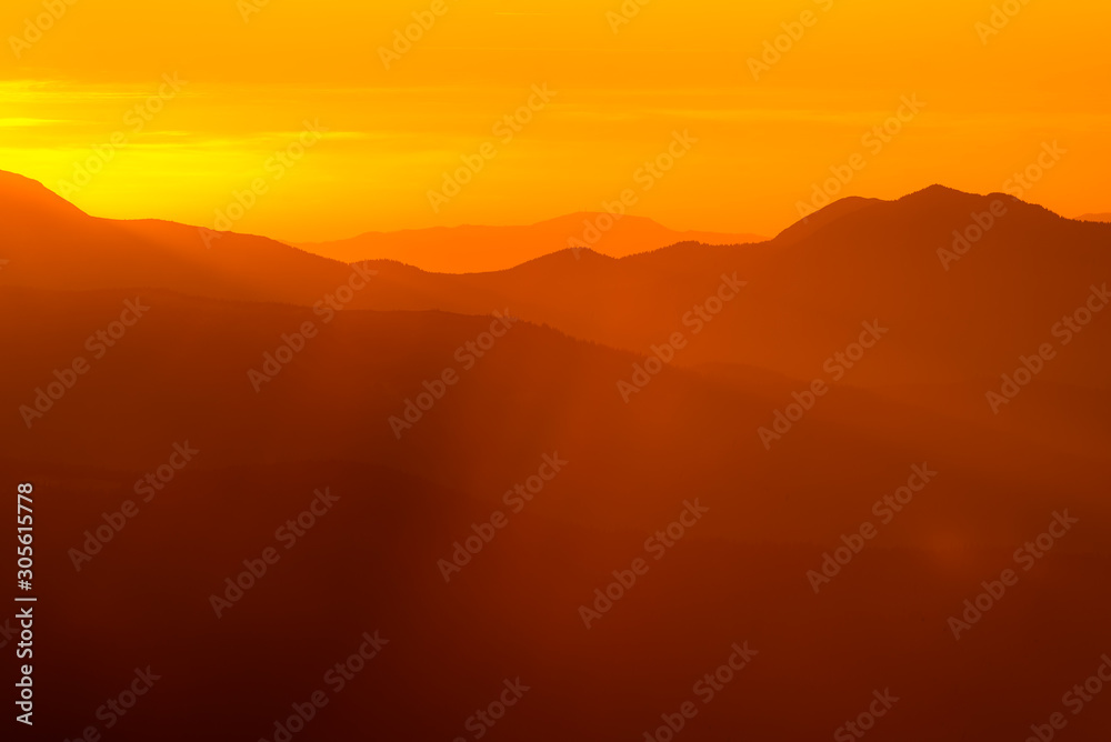 mountain silhouettes at the sunset