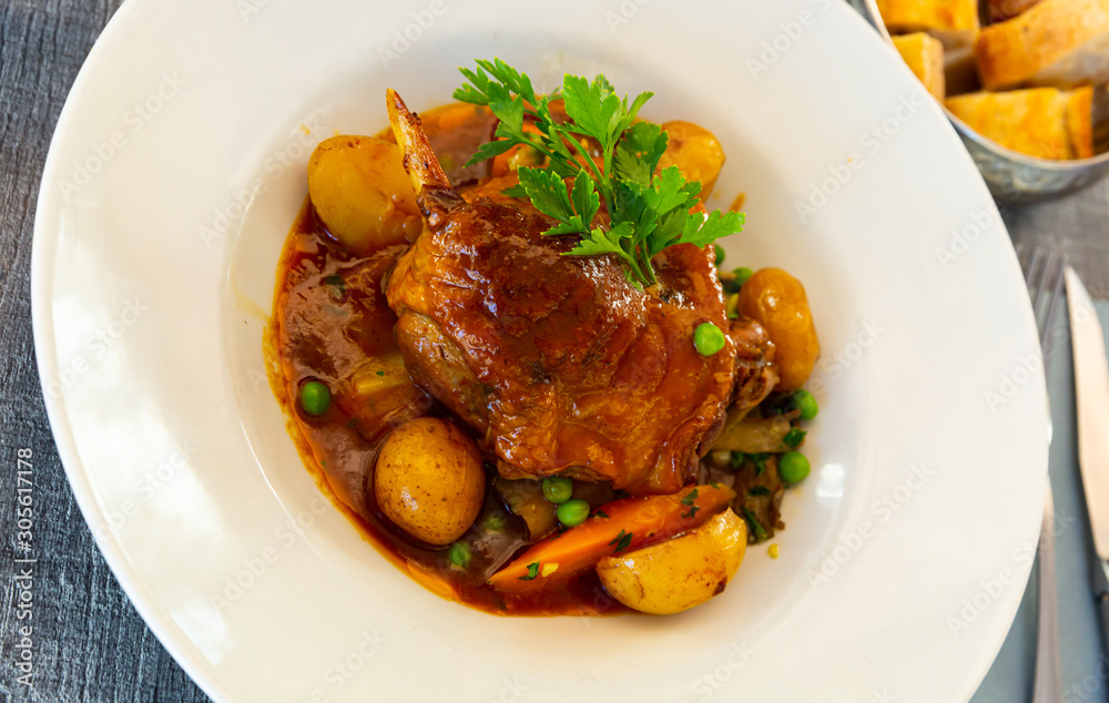 Braised duck leg with vegetables