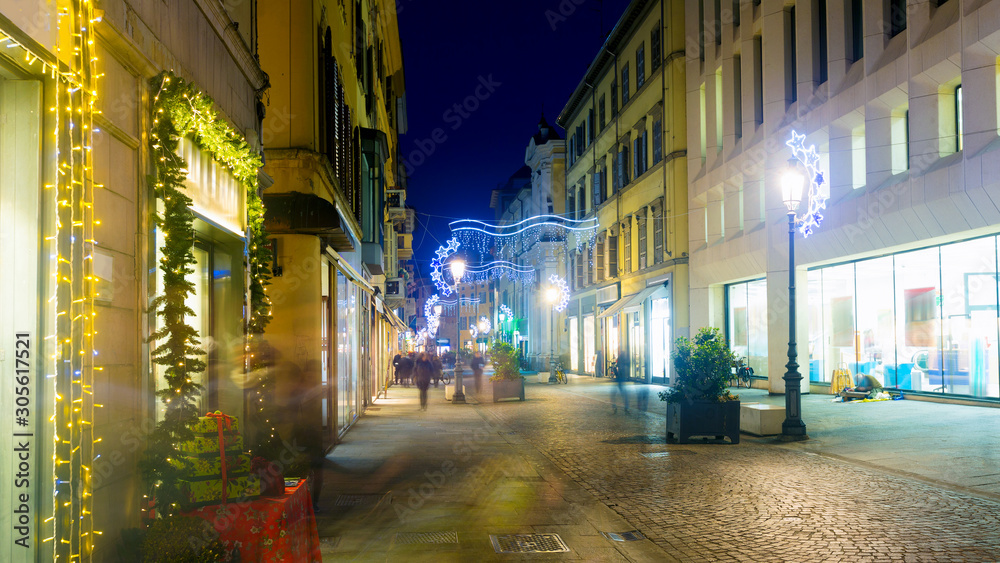  New Year's illuminated streets of Parma  at evening, Italy