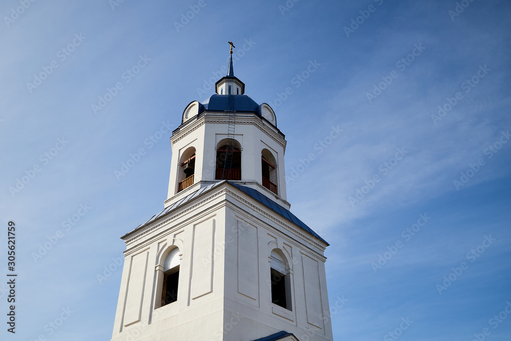 Dome and cross of the traditional Russian Orthodox Church and the sky in background