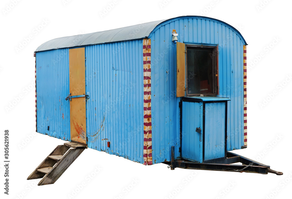 An old aged steel blue trailer was once used to transport circus ...