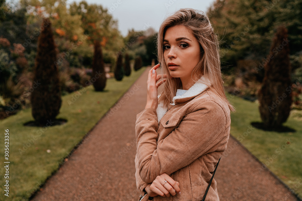 Portrait Charming Young Woman with Blonde Hair, Street Style Portrait Charming Young Woman with Blonde Hair, Street Style