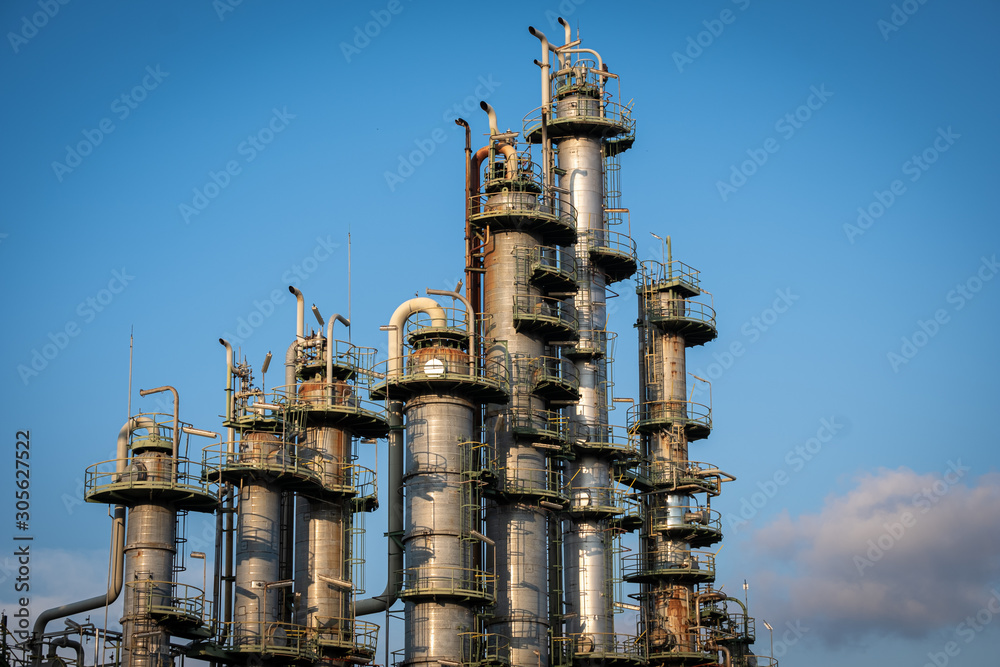 Distillation column towers  with blue sky background  in chemical plant.