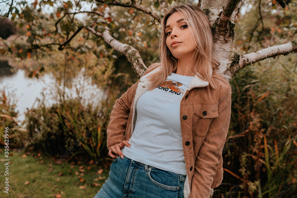Portrait Charming Young Woman with Blonde Hair, Street Style Portrait Charming Young Woman with Blonde Hair, Street Style