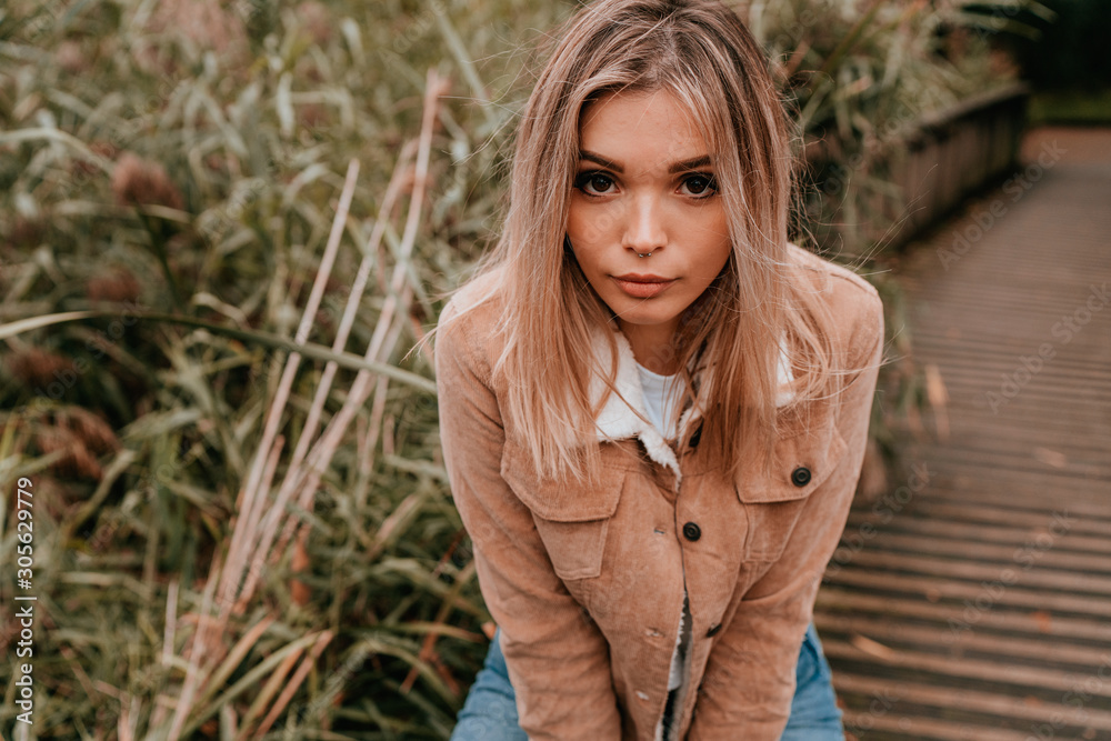 Portrait Charming Young Woman with Blonde Hair, Street Style Portrait Charming Young Woman with Blonde Hair, Street Style