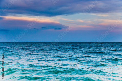Ocean and evening sky for a background.