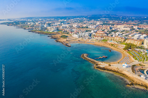 Cyprus. Protaras aerial view. Church of St. Nicholas with a quadcopter. White Church in Cyprus. Panorama of the city of Protaras. The beaches of Cyprus. Port Paralimni. Mediterranean Sea