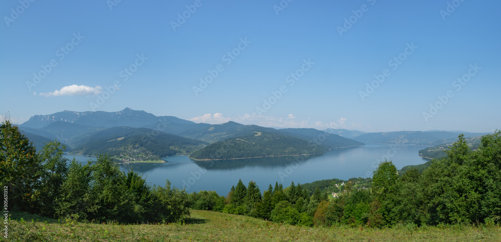 Beautiful panoramic view of Lake Izvorul Muntelui (Lacul Bicaz) in Romania