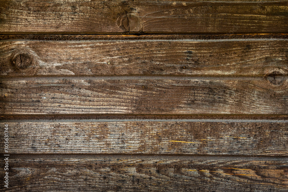 Fototapeta premium The shield of the old boards dark color, background