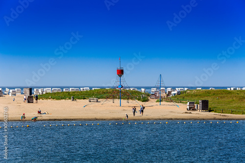 View of the beach area of the family lagoon Perlebucht, Büsum, North Sea, Germany photo