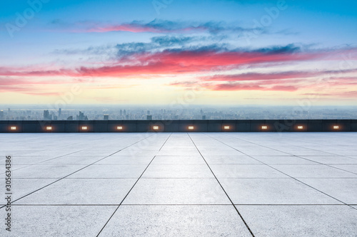 Empty floor and city skyline with beautiful clouds scenery in Shanghai at sunset.high angle view.