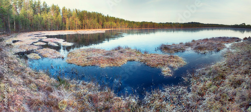 Panorama of the lake two sisters in the national park of the swamp Lammin Suo in the Leningrad region in autumn in November