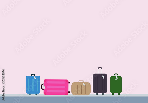 Multicolor luggage, suitcase, bags on conveyor belt in airport terminal.