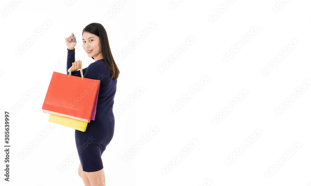 Girl with shopping bags and credit cards in white background Happy with shopping Girl with shopping bags and credit cards in white background Happy with shopping