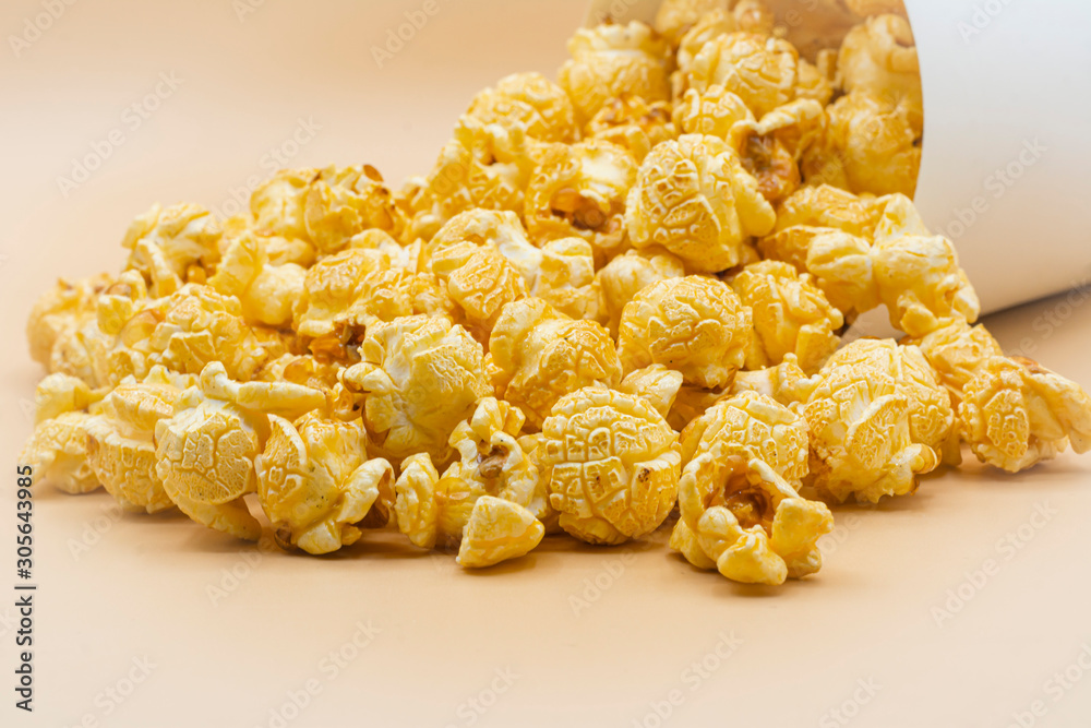  paper bucket of popcorn on  color background