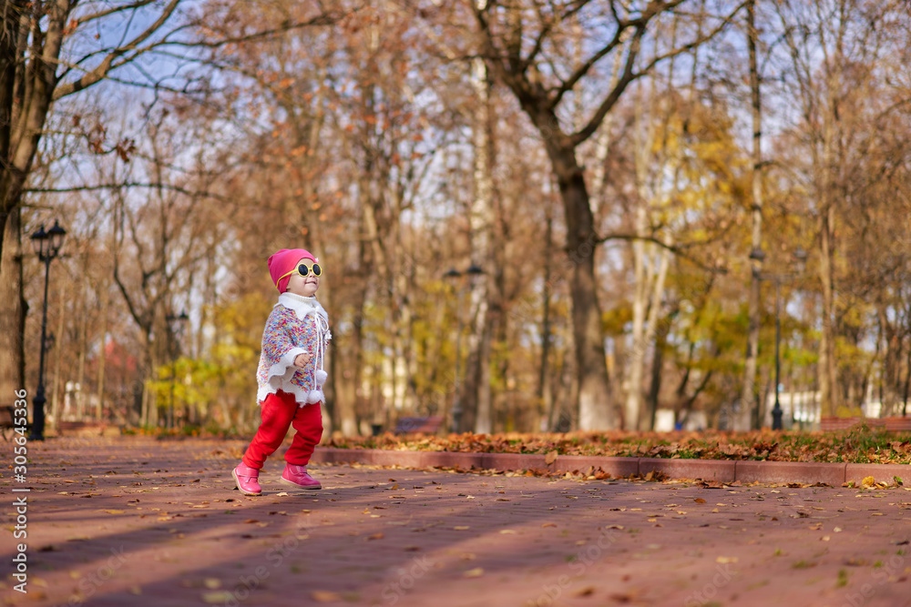 happy baby running in the nature