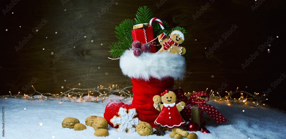 Nikolaus Stiefel - gefüllter Nikolausstiefel - Weihnachten Hintergrund  Banner Stock Photo | Adobe Stock