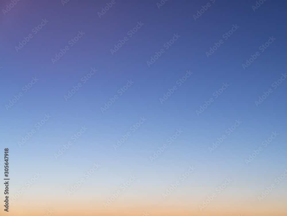 Gradient sky in sunset time with orange to baby blue color / gradient effect / background concept / sky texture Gradient sky in sunset time with orange to baby blue color / gradient effect / background concept / sky texture