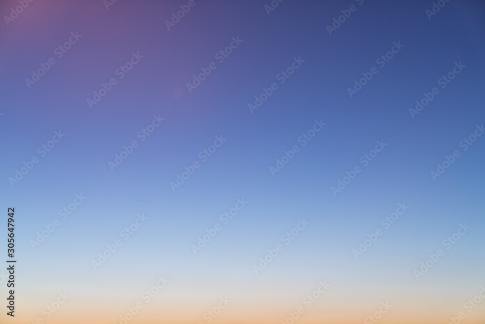 Gradient sky in sunset time with orange to baby blue color / gradient effect / background concept / sky texture
